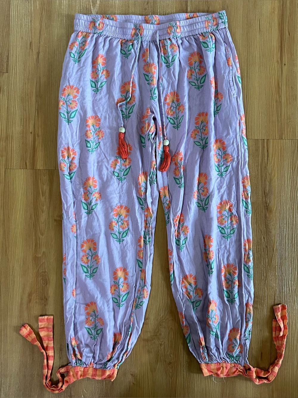 World Market Lavender Floral Smocked waist Pants with Orange Flowers and tie hem